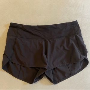 solid black lululemon speed up shorts 2.5 inch